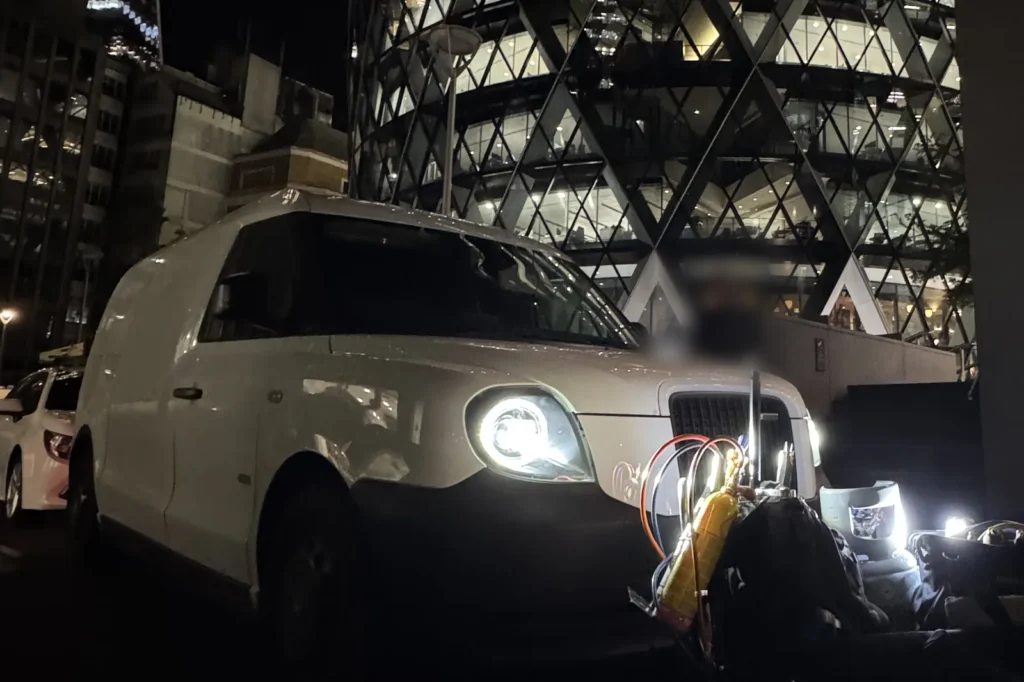 Refrigeration engineer's van and gauges on a late-night emergency call-out in central London